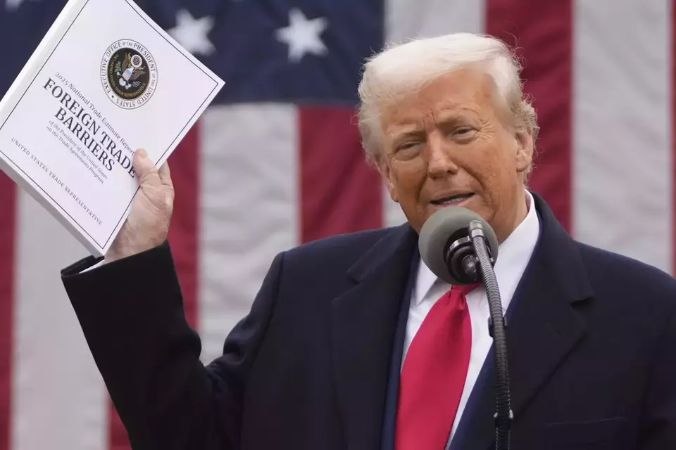US President Donald Trump announces new tariffs in the Rose Garden at the White House on April 2, 2025. (AP Photo/Mark Schiefelbein)