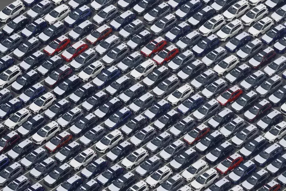 This photo shows vehicles bound for foreign countries at a logistics center in Kawasaki near Tokyo, Thursday, March 27, 2025. (Michi Ono/Kyodo News via AP)