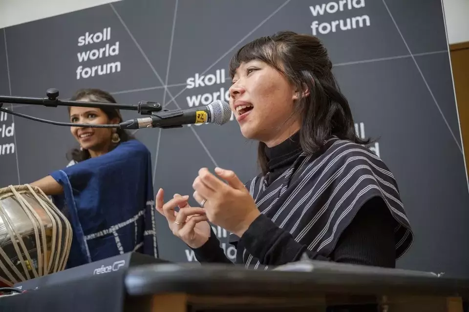 Rara Sekar, who goes by Hara, performs during a session at the Skoll World Forum on Thursday, April 3, 2025, in Oxford, England. (AP Photo/Vickram Sombu)