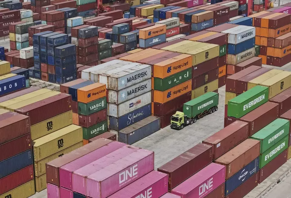 An aerial view of Xiasha Container Terminal on a canal in Hangzhou in east China's Zhejiang province Sunday, April 06, 2025. (Chinatopix Via AP)