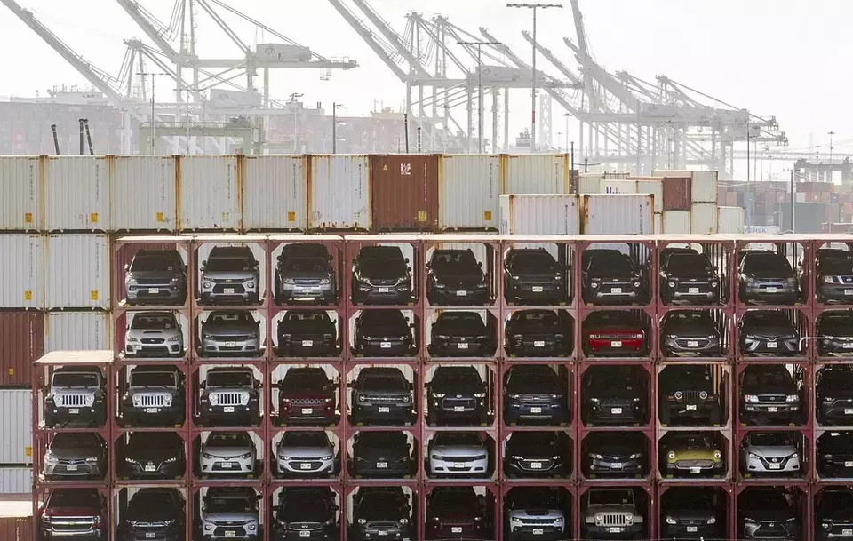 Vehicles line a shipping terminal at the Port of Oakland on Tuesday, April 15, 2025, in Oakland, California. (AP Photo/Noah Berger)
