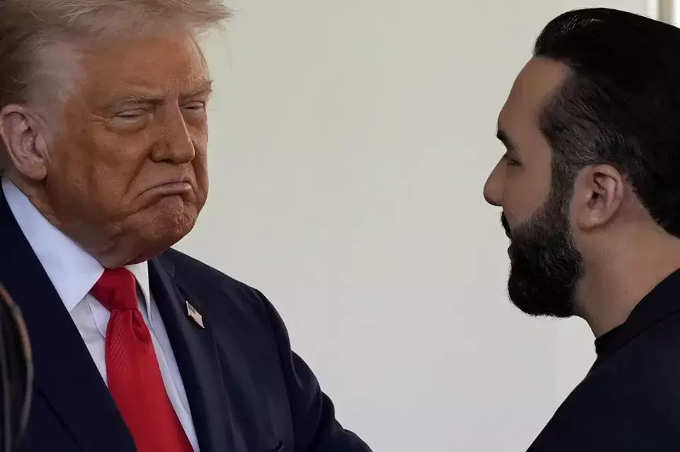 US President Donald Trump greets El Salvador's President Nayib Bukele as he arrives at the West Wing of the White House in Washington, April 13, 2025. (AP Photo/Alex Brandon)