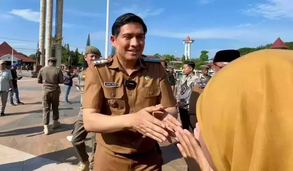 This undated photo shows Indramayu Regent Lucky Hakim greeting a resident. (Handout)