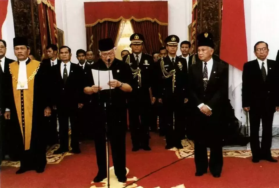 This photo, issued by the office of the Vice President, shows President Suharto reading his resignation speech at Merdeka Palace on May 21, 1998.