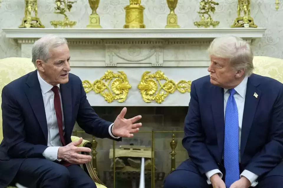 US President Donald Trump listens to Norwegian Prime Minister Jonas Gahr Store during a bilateral meeting in the Oval Office of the White House on April 24, 2025 in Washington. (AP Photo/Mark Schiefelbein)