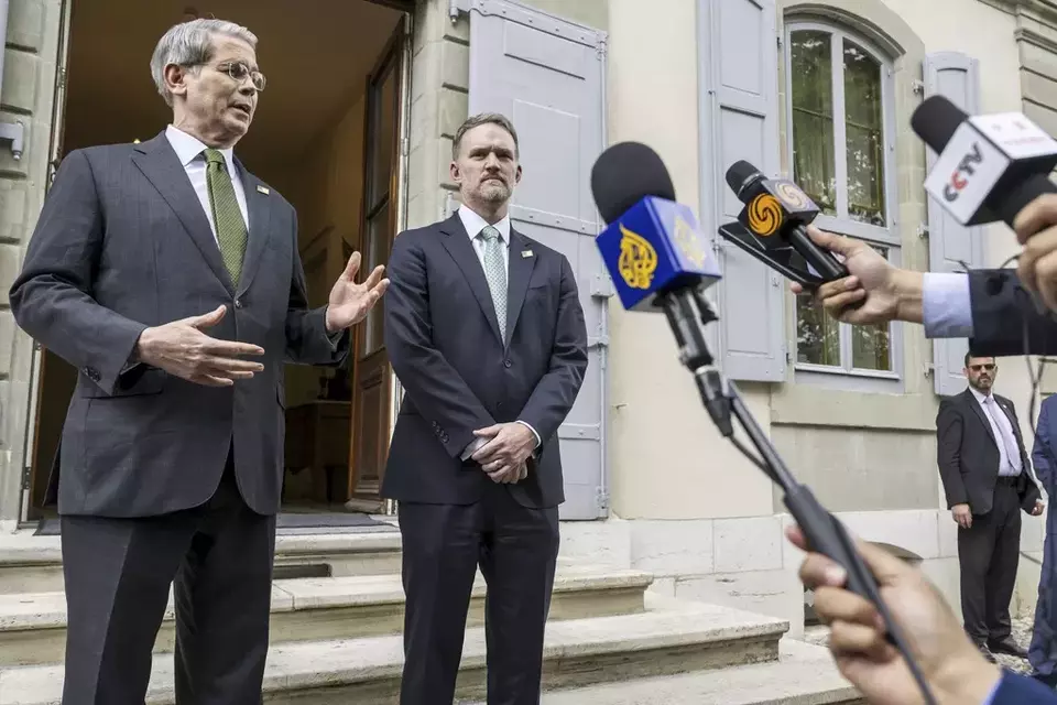 US Secretary of the Treasury Scott Bessent, left, and US Trade Representative Jamieson Greer speak to the press after the second day of a bilateral meeting between the United States and China, in Geneva, Switzerland, Sunday, May 11, 2025. (Martial Trezzini/Keystone via AP)