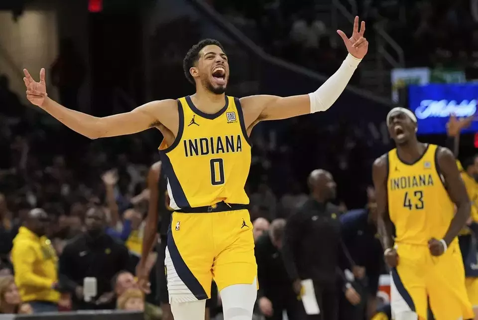 Indiana Pacers guard Tyrese Haliburton, left, celebrates along with forward Pascal Siakam after scoring during the second half in Game 5 of an Eastern Conference semifinal NBA basketball playoff against the Cleveland Cavaliers, Tuesday, May 13, 2025, in Cleveland. (AP Photo/Sue Ogrocki)