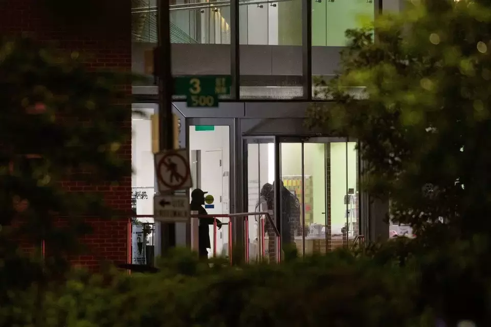 Law enforcement works the scene after two staff members of the Israeli Embassy in Washington were shot and killed outside the Capital Jewish Museum, Thursday, May 22, 2025, in Washington. (AP Photo/Rod Lamkey, Jr.)