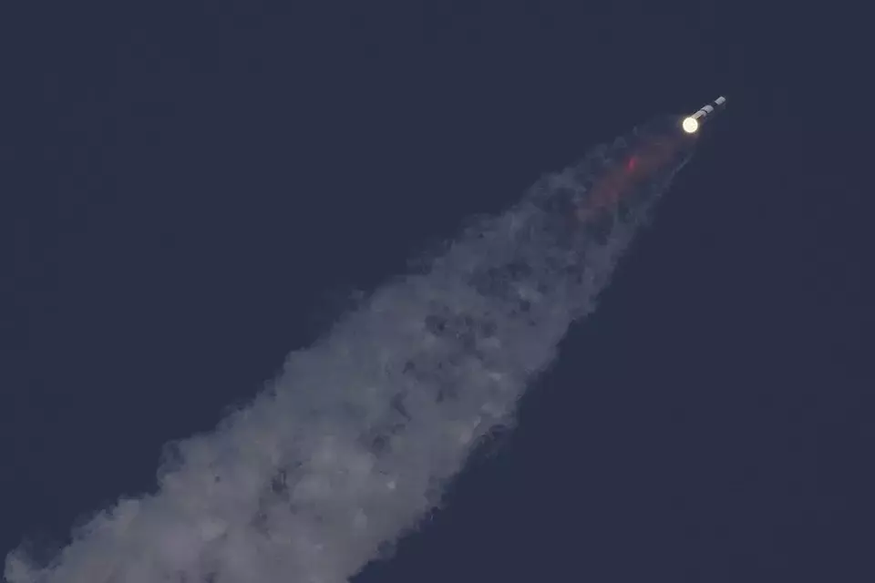 SpaceX's mega rocket Starship makes a test flight from Starbase, Texas, Tuesday, May 27, 2025. (AP Photo/Eric Gay)
