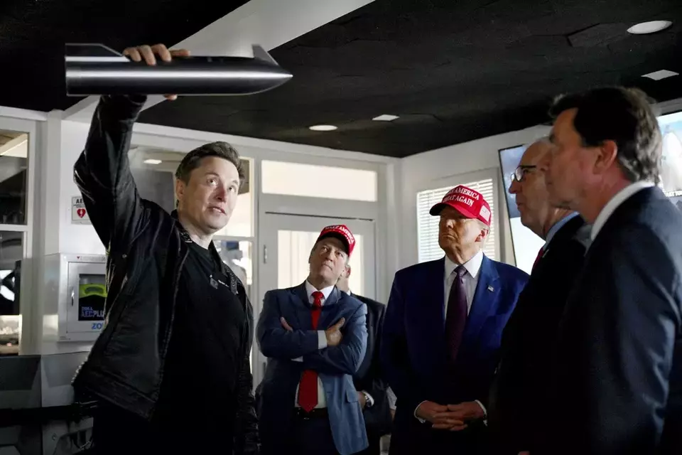 FILE - President-elect Donald Trump listens as Elon Musk explains the operations ahead of the launch of the sixth test flight of the SpaceX Starship rocket, Nov. 19, 2024, in Boca Chica, Texas. (Brandon Bell/Pool via AP, File)