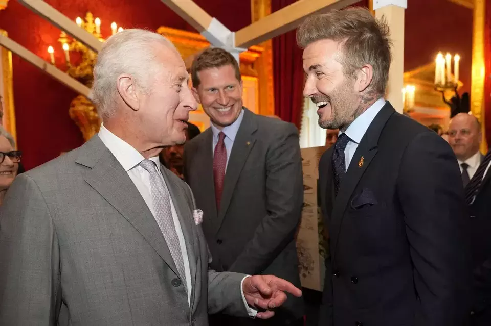 FILE - Britain's King Charles III, left, speaks to former footballer David Beckham as they attend the inaugural King's Foundation charity awards at St James's Palace in London, Tuesday, June 11, 2024. (AP Photo/Kirsty Wigglesworth, Pool, File)