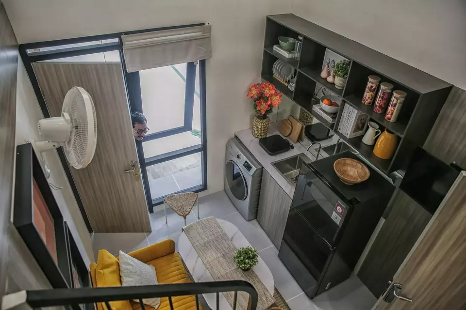 A visitor looks inside the interior of the display unit of downsized, subsidized houses in Jakarta on Sunday, June 15, 2025. (B-Universe Photo/Joanito De Saojoao)