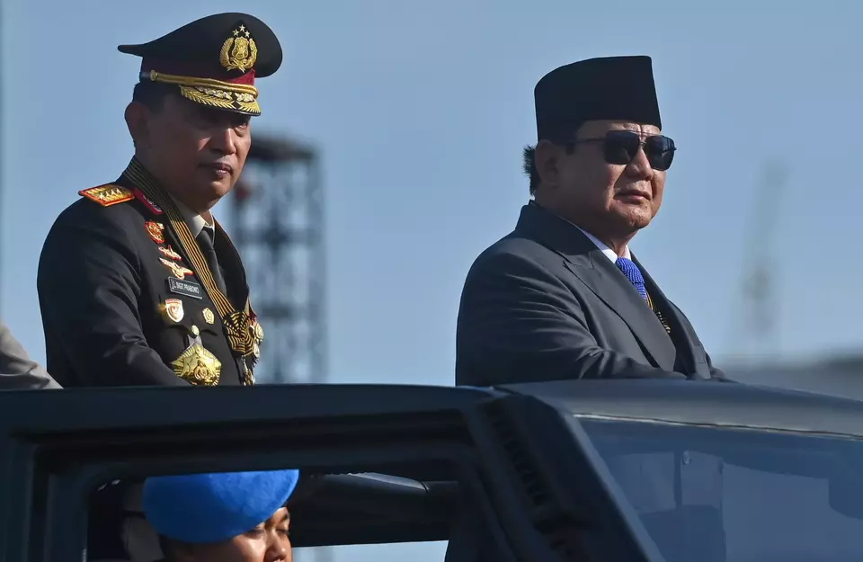 President Prabowo Subianto (right) and National Police Chief Listyo Sigit Prabowo (left) attend the Bhayangkara Day ceremony at the National Monument in Jakarta on July 1, 2025. (Antara Photo/Rivan Awal Lingga) 