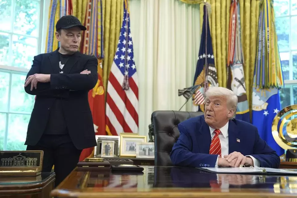 President Donald Trump, right, speaks during a news conference with Elon Musk in the Oval Office of the White House, Friday, May 30, 2025, in Washington. (AP Photo/Evan Vucci)

