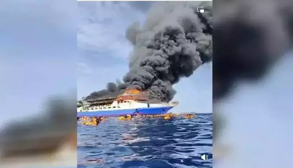 This image from a video circulating on social media platforms shows a passenger ferry engulfed in a fire off North Sulawesi province, Sunday, July 20, 2025. (Videography)