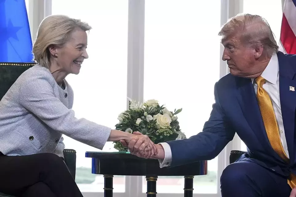 US President Donald Trump and European Commission President Ursula von der Leyen shake hands after reaching a trade deal at the Trump Turnberry golf course in Turnberry, Scotland, Sunday, July 27, 2025. (AP Photo/Jacquelyn Martin)