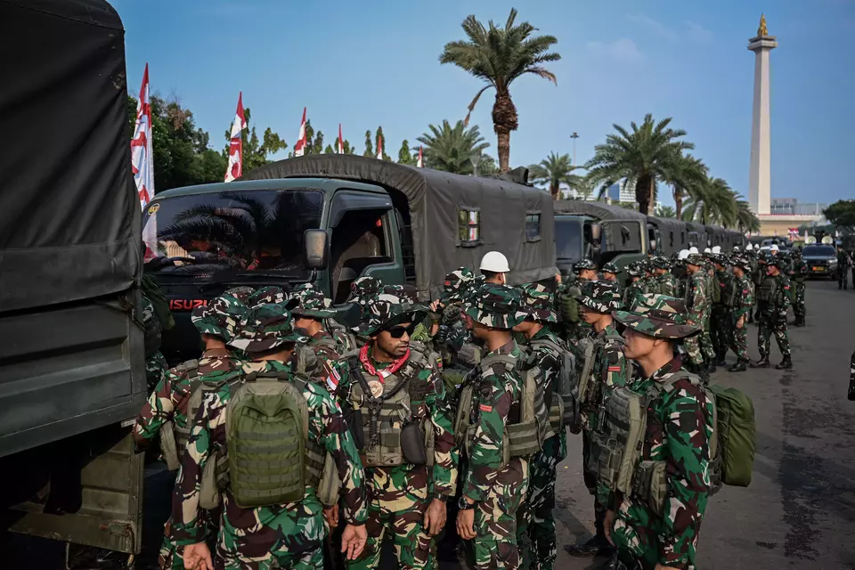 FILE - Army soldiers are deployed around the National Monument (Monas) on Sunday, Aug. 31, 2025, amid violent demonstrations across the capital. (Antara Photo/Fauzan)