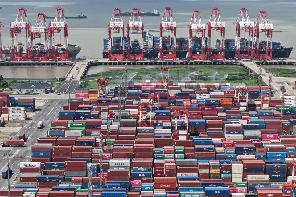 An aerial view of a container terminal in Shanghai, China, Monday, Oct. 13, 2025. (Chinatopix via AP)