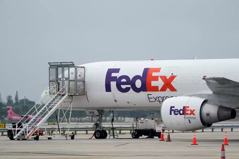 FILE - A FedEx cargo plane is shown on the tarmac at Fort Lauderdale-Hollywood International Airport, Tuesday, April 20, 2021, in Fort Lauderdale, Fla. (AP Photo/Wilfredo Lee, File)