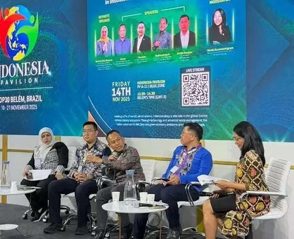 Budiawansyah, center, director and chief sustainability & corporate affairs officer of PT Vale Indonesia, speaks during a talk show at the Indonesia Pavilion at the COP30 climate conference in Belem, Brazil, Friday, Nov. 14, 2025. (Handout Photo)