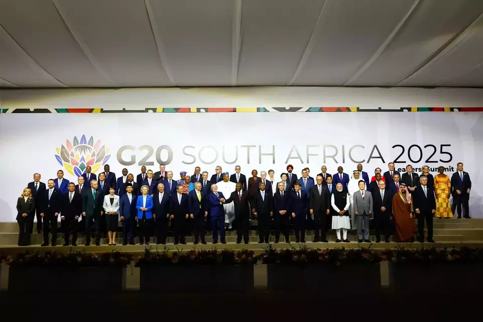 Leaders and delegates pose for a group photo, on the opening day of the G20 Leaders' Summit, in Johannesburg on Nov. 22, 2025. (Thomas Mukoya/Pool Photo via AP)