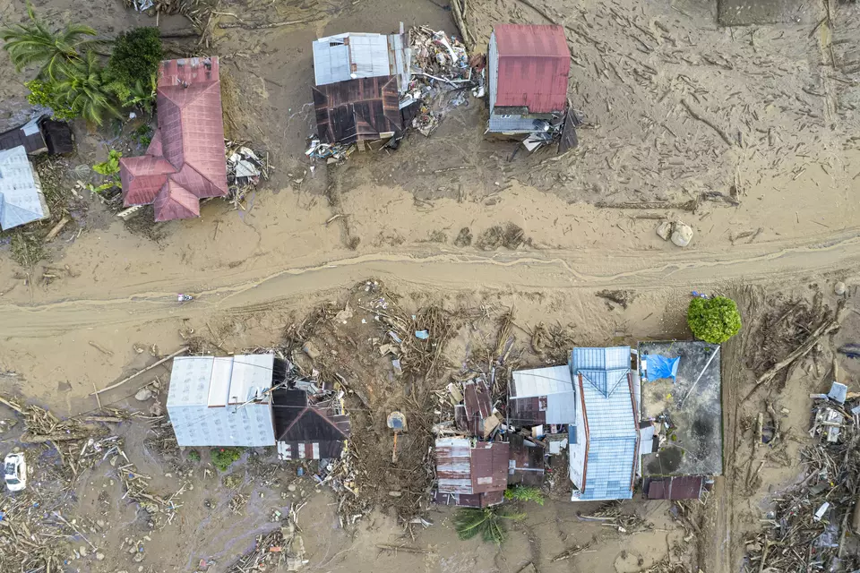 This aerial photo shows the damaged houses affected by the flash flood in Agam, West Sumatra on Nov. 30, 2025. (Antara Photo/Wahdi Septiawan)