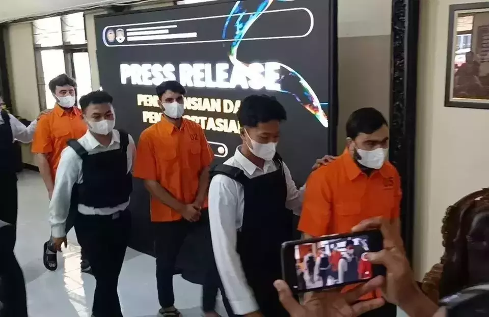 Three Pakistani nationals are detained by the immigration office in Blitar, East Java, for violating their stay permit and falsely claiming to make an investment in Indonesia, Tuesday, Dec. 23, 2025. (B-Universe Photo/Dwi Haryadi)