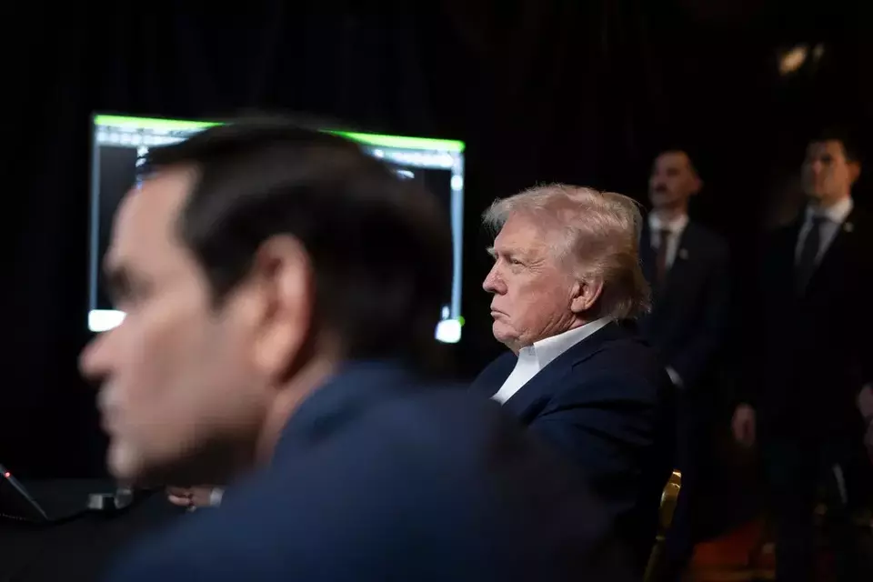 In this photo released by the White House, President Donald Trump monitors U.S. military operations in Venezuela, with Secretary of State Marco Rubio at Mar-a-Lago in Palm Beach, Florida, Saturday, Jan. 3, 2026. (Molly Riley/The White House via AP)