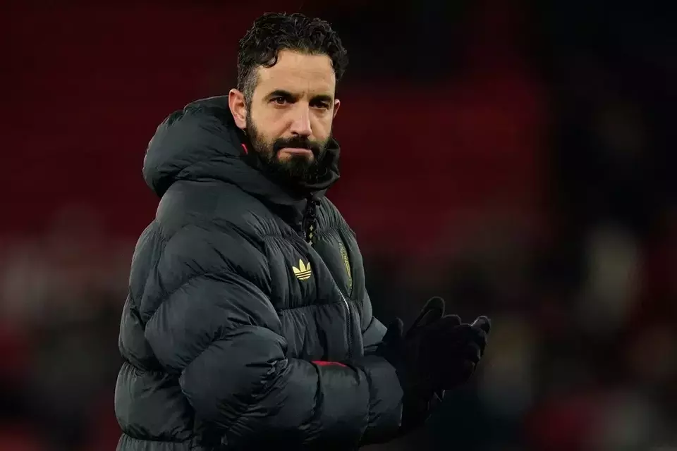 FILE - Manchester United's head coach Ruben Amorim walks on the pitch after the English Premier League soccer match between Manchester United and Wolverhampton Wanderers in Manchester, England, Tuesday, Dec. 30, 2025. (AP Photo/Dave Thompson, file)

