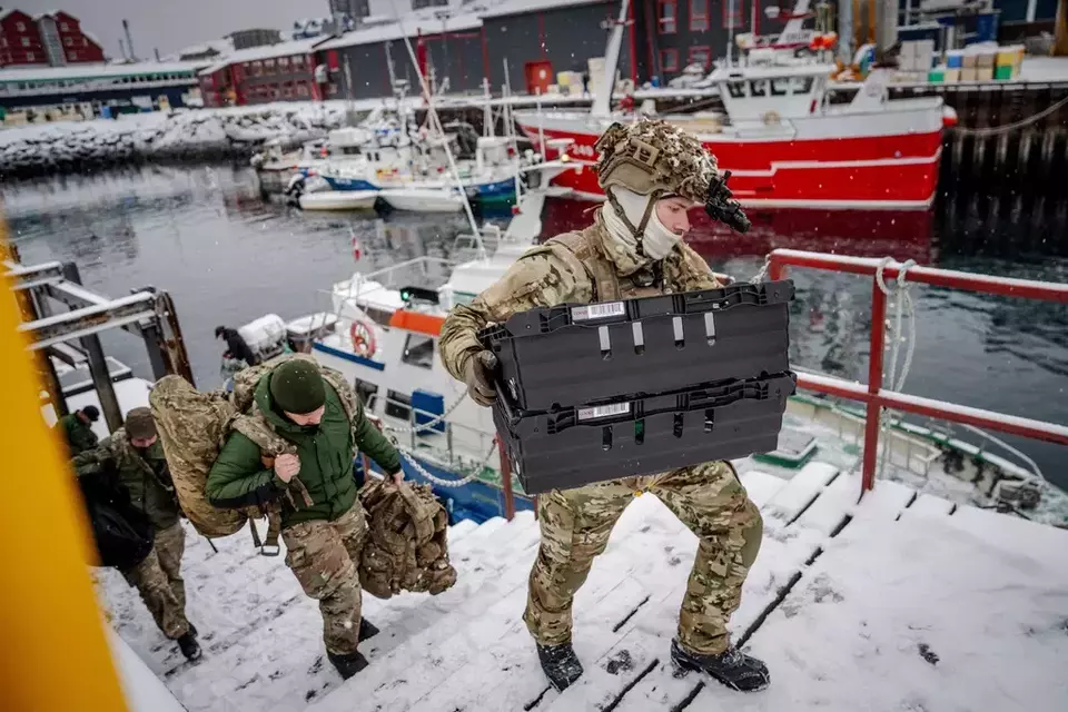 Danish soldiers disembark at the harbor in Nuuk, Greenland, on Sunday, Jan. 18, 2026. (Mads Claus Rasmussen/Ritzau Scanpix via AP)


