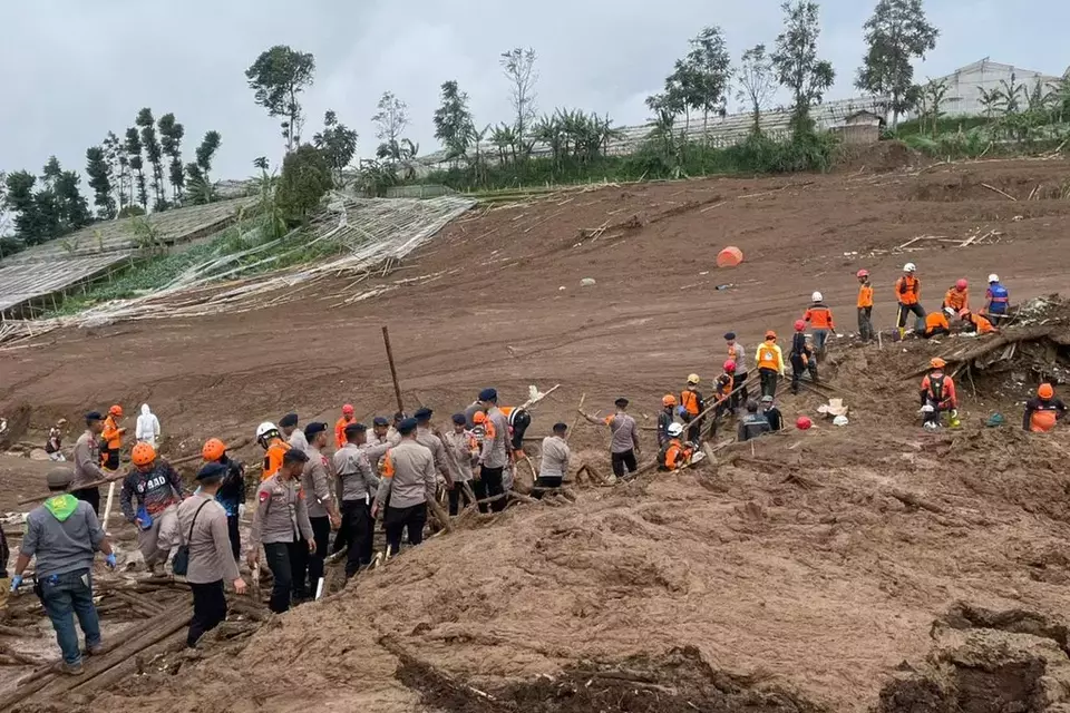 Rescuers search for victims after a landslide in Cisarua District, West Bandung, Sunday, Jan. 25, 2026. (Photo courtesy of Basarnas)