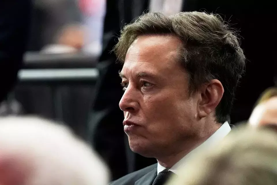 FILE - Elon Musk attends a memorial for conservative activist Charlie Kirk, Sunday, Sept. 21, 2025, at State Farm Stadium in Glendale, Ariz. (AP Photo/Julia Demaree Nikhinson, File)

