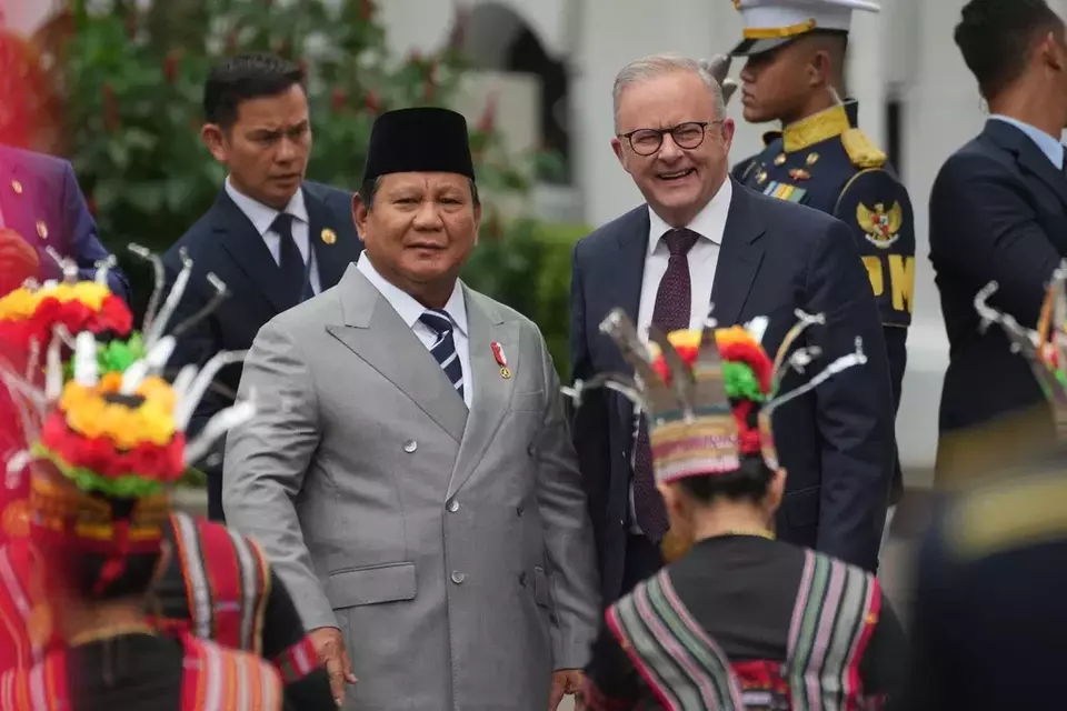 Australian Prime Minister Anthony Albanese, right, is greeted by President Prabowo Subianto upon arrival for their meeting at Merdeka Palace in Jakarta, Indonesia, Friday, Feb. 6, 2026. (AP Photo/Achmad Ibrahim)