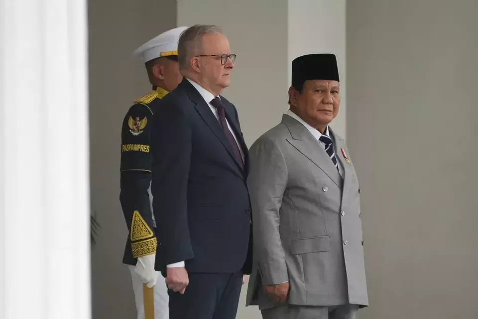 Australian Prime Minister Anthony Albanese, left, stands with President Prabowo Subianto during a welcoming ceremony prior to their meeting at Merdeka Palace in Jakarta, Indonesia, Friday, Feb. 6, 2026. (AP Photo/Achmad Ibrahim)