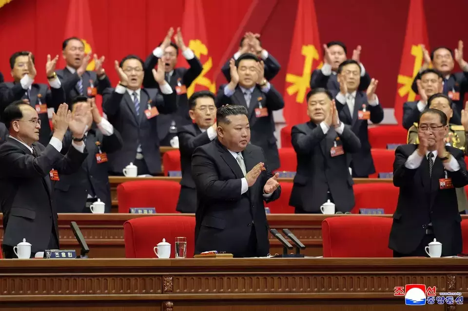 This photo provided Monday, Feb. 23, 2026, by the North Korean government, shows its leader Kim Jong Un, center, clapping hands as he was re-elected to the top post of the ruling Workers' Party, during the party's Congress in Pyongyang, Sunday, Feb. 22, 2026. (KCNA via AP)