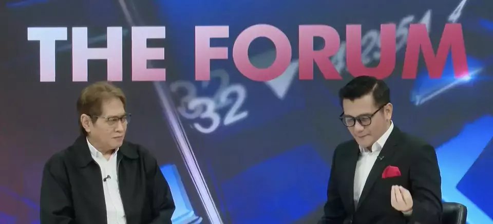 Iman Pambagyo (left), Former Trade Ministry Director General, speaks during The Forum talk show alongside host Iqbal Suwitamihardja (right) at the B-Universe Media Group studio at Tangerang on Monday, Feb. 23, 2026. (Screenshot of The Forum)