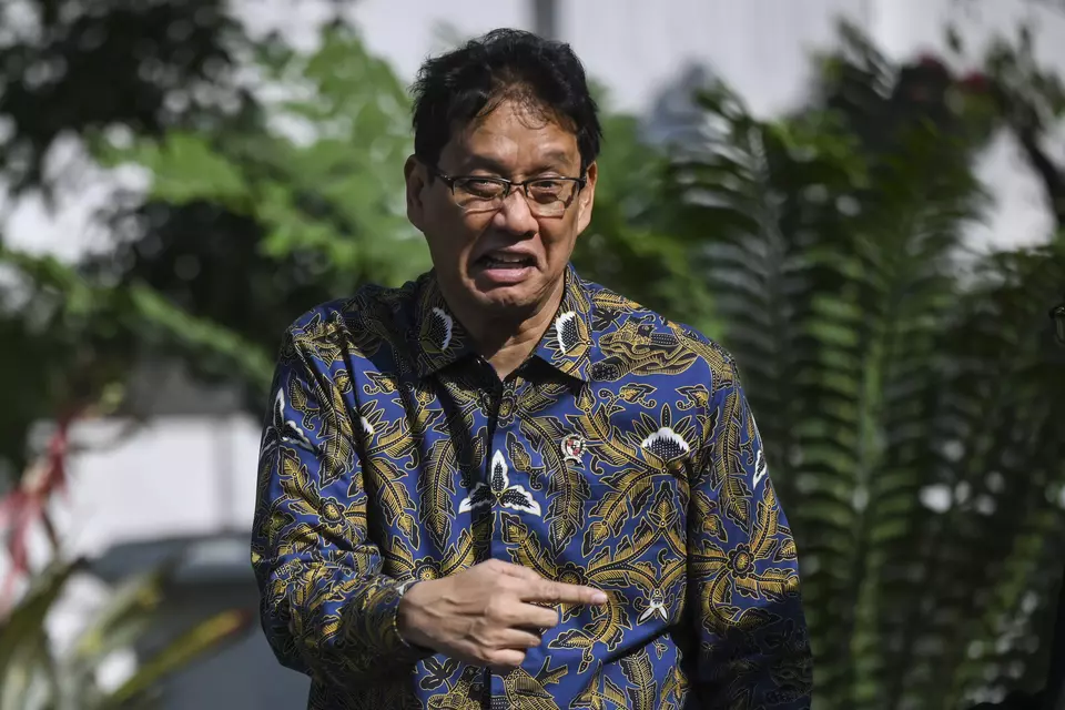 Finance Minister Purbaya Yudhi Sadewa walks after attending a meeting chaired by President Prabowo Subianto at the Presidential Palace Complex in Jakarta on May 21, 2026. (Antara Photo/Hafidz Mubarak A/wsj).
