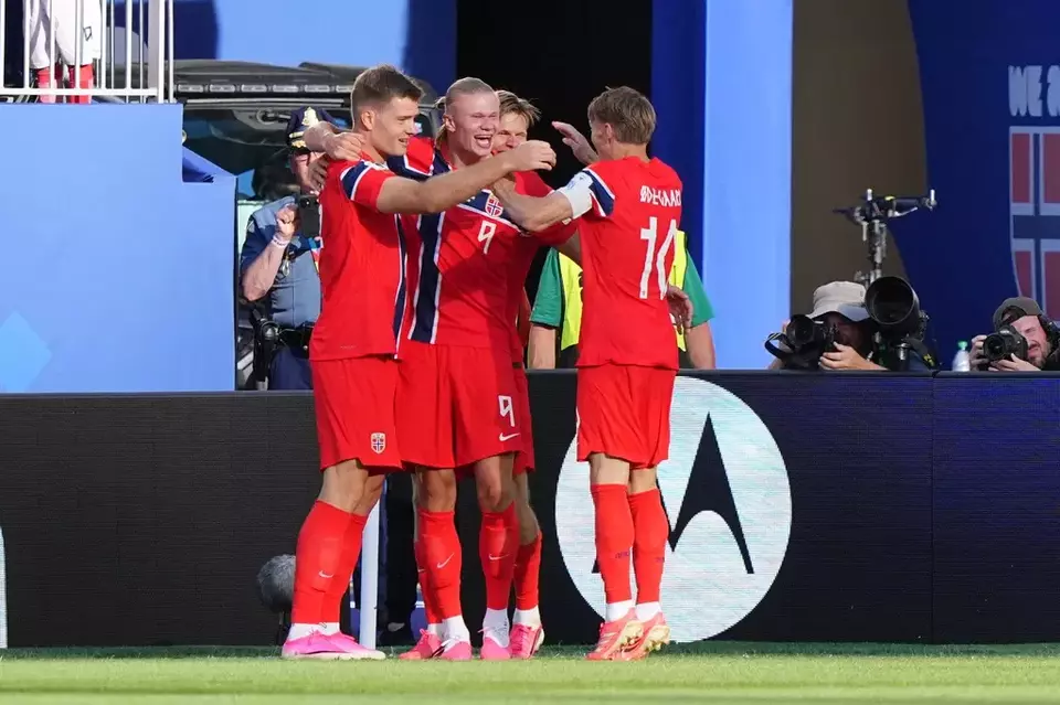Norway's Erling Haaland (9) is congratulated after scoring his side's opening goal during the World Cup Group I soccer match between Iraq and Norway in Foxborough, Mass., near Boston, Tuesday, June 16, 2026. (AP Photo/Martin Meissner)