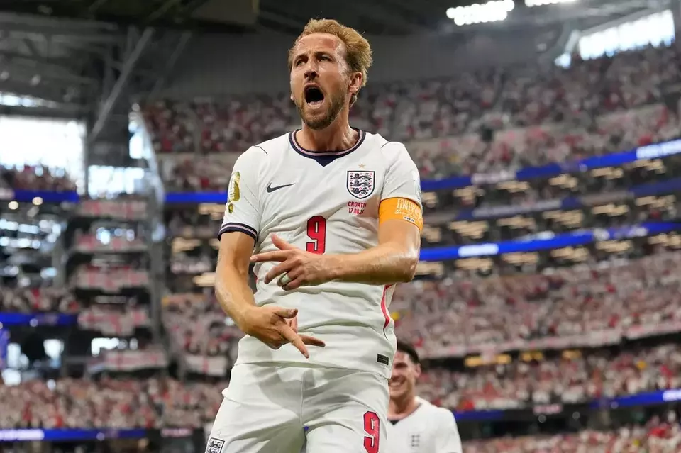 England's Harry Kane (9) celebrates after scoring a goal during the World Cup Group L soccer match between England and Croatia in Arlington, Texas, near Dallas, Wednesday, June 17, 2026. (AP Photo/Tony Gutierrez)